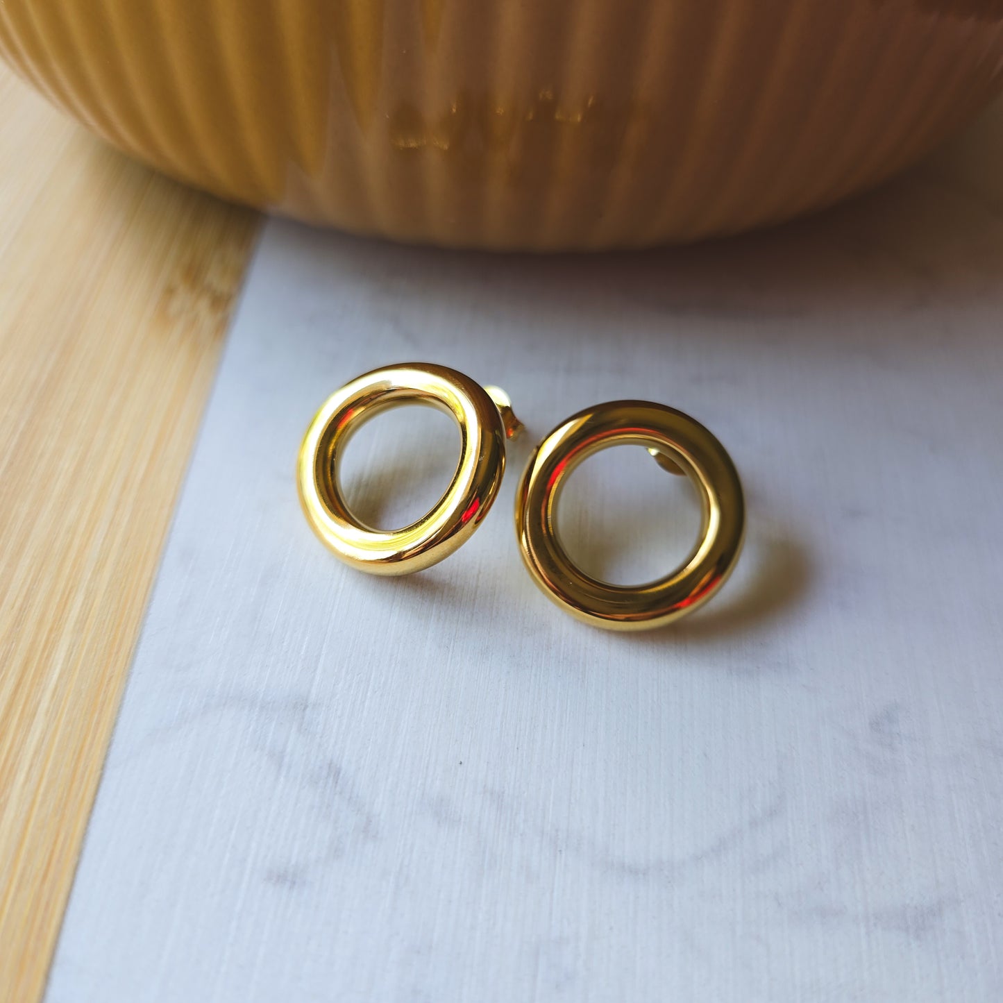 Round hoop gold earrings