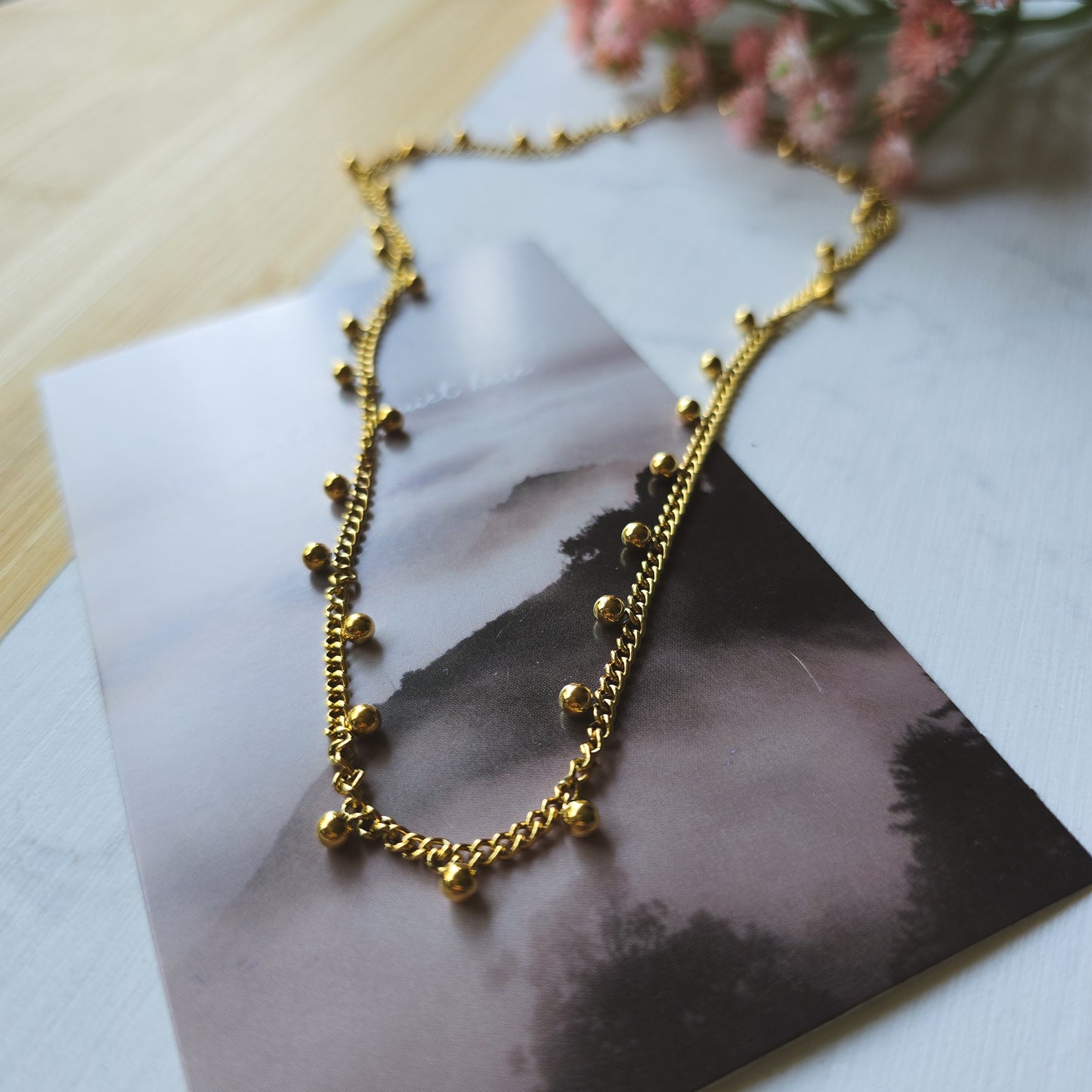 Beaded gold necklace