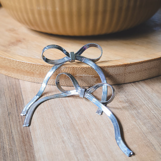 Silver bow earrings