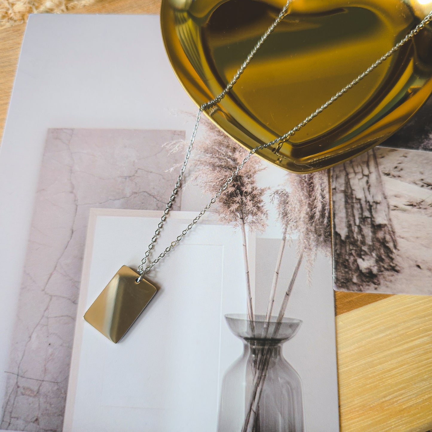 Blank page silver necklace