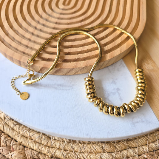 Gold bead charm snake chain necklace