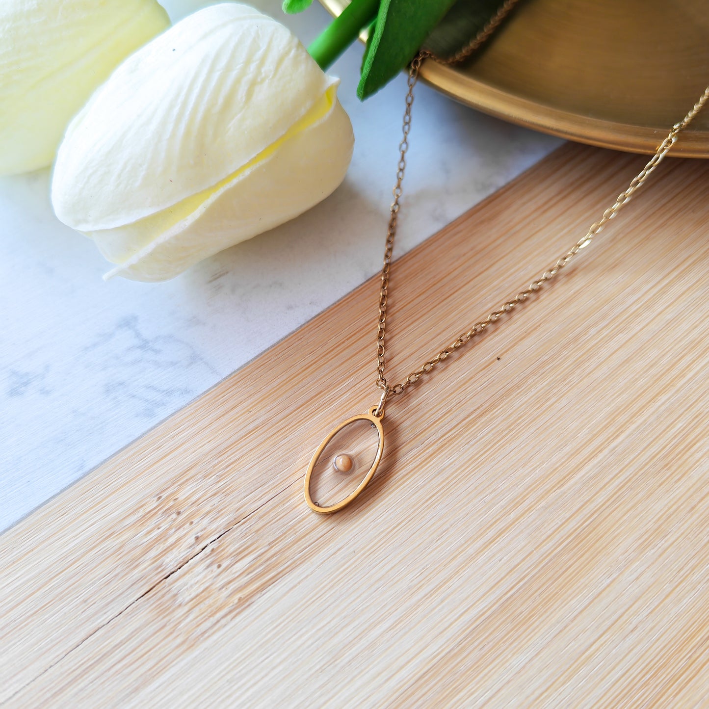 Oval gold mustard seed necklace