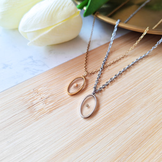Oval silver mustard seed necklace