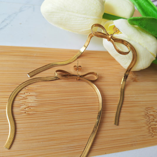 Bow small gold earrings