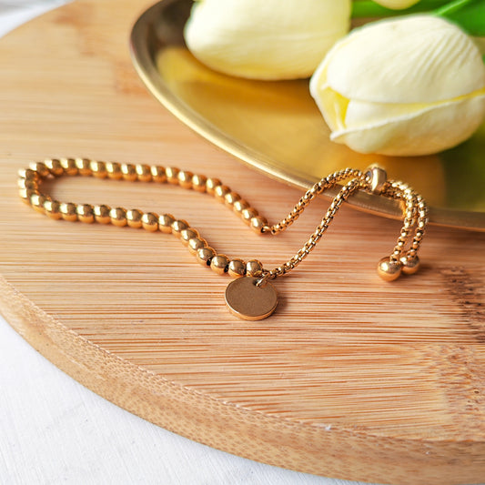 Adjustable gold beaded bracelet